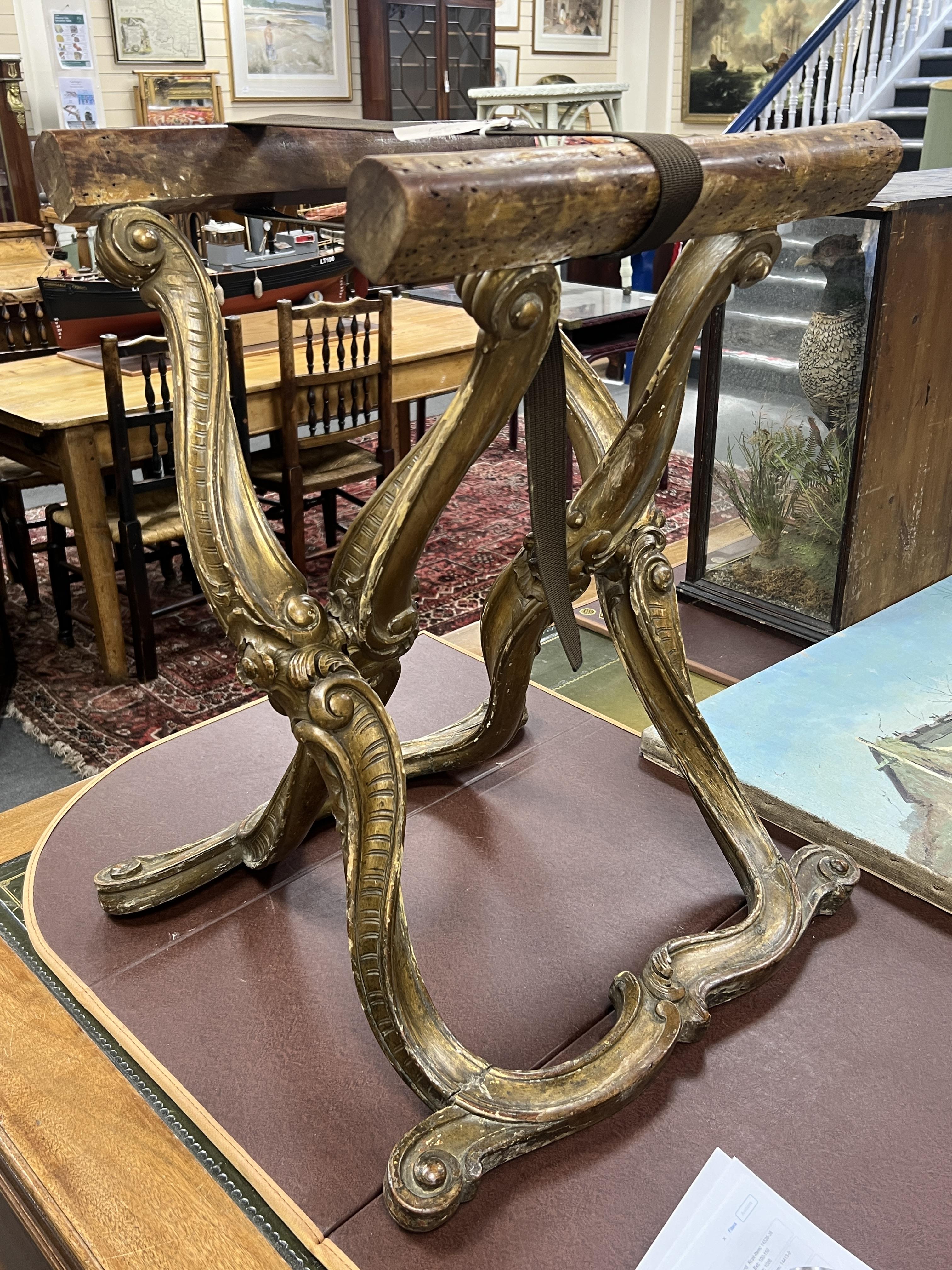 A 19th century Italian carved giltwood folding stand